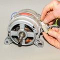 Disconnecting the terminals from the washing machine motor