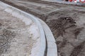 Repair of the road, installation of curbs near the carriageway and filling of pits with crushed stone.