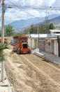 Repair of roads along Museo Solar, San Antonio, Mitad del Mundo, Quito. Transport works, a tractor, heavy machinery. 04.09.2018