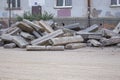 Repair of roads.the curb from the dismantled road lies on the asphalt