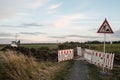 repair of a rural road, a warning sign, a fence and special equipment