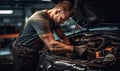 Repair service. Auto mechanic working on car in mechanics garage. Royalty Free Stock Photo