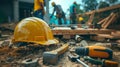A repair team is engaged in work at a construction site, surrounded by tools and materials during the afternoon Royalty Free Stock Photo