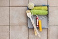 Repair tools over stone floor tile background. Copy space. Royalty Free Stock Photo