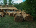 Repair of traditional thatched roof. Ukraine