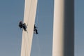 Repair at the wind turbine, climbing, workers