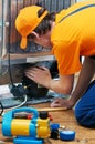 Repair work on fridge appliance