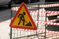 Repair work. Repair of roads on the streets. The construction site of the streets of the city with barricades and a network of Royalty Free Stock Photo