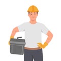 Repair worker holding toolbox. Young man construction worker in helmet and uniform, man with toolkit and diy tools in plastic box Royalty Free Stock Photo