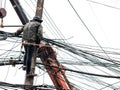 Repair workers are swinging on cable posts to fix the line of in