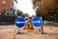 Repair works on the road, road signs: Roadworks, Turn right and Turn left Royalty Free Stock Photo