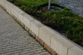 Repaired renovated sandstone walls near the cemetery. stairs and railings of the wall made of new stone which weatheres quickly bu Royalty Free Stock Photo