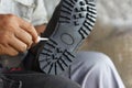 Repairing broken shoes by a shoe repairman Royalty Free Stock Photo