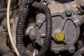 Repairing Of Diesel Engine Close Up Of Worker Hands. Repairing of modern diesel engine. Close-up of an auto mechanic working on a Royalty Free Stock Photo