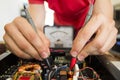 REPAIRING ELECTRONICS WITH TEST EQUIPMENT Royalty Free Stock Photo
