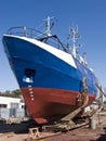 Repairing fishing boat