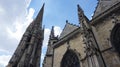 Repairing Gothic style architecture under bright sky