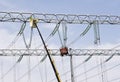 Repairing high voltage power lines Royalty Free Stock Photo