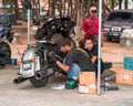 Repairing the motorcycle during Terengganu bike week events.