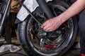 Repairing motorcycle tire with repair kit, Tire plug repair kit for tubeless tires.