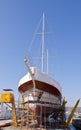 Repairing the old sailingship in the shipyard