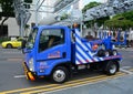 Repairing roads on the one of Singapore street