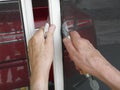 Repairing Screen Door with Spline Tool