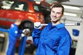Repairman auto mechanic at work