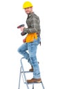 Repairman with drill machine climbing ladder Royalty Free Stock Photo