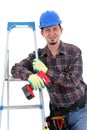 Repairman with drill, white background