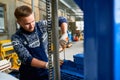 Repairman Fixing Machine Units at Factory Royalty Free Stock Photo