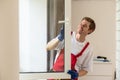A repairman fixing windows in new apartment Royalty Free Stock Photo
