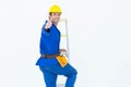 Repairman gesturing thumbs up while climbing step ladder Royalty Free Stock Photo