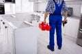 Repairman Holding Tool Box Installing Kitchen Royalty Free Stock Photo