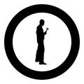 Repairman master man in overalls with tool in his hands hammer icon black color vector in circle round illustration flat style