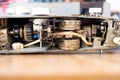 Internal parts of a sewing machine. sewing machine works in a rotating Bobbin view from the bottom of the machine. closeup. Royalty Free Stock Photo