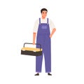 Repairman in overall portrait. Master standing with toolbox. Professional home worker. Handyman in uniform. Workman for Royalty Free Stock Photo