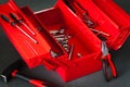 Repairman red toolbox with wrench tool kit