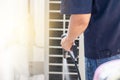 Repairman washing dirty compartments air conditioner, Male technician cleaning air conditioner indoors, Maintenance and repairing Royalty Free Stock Photo