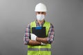 Repairman worker with clipboard. Worker man wearing face mask Royalty Free Stock Photo