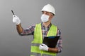 Repairman worker with clipboard pointing to somewhere Royalty Free Stock Photo