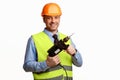 Repairman Worker Holding Electric Drill Posing Over White Studio Background Royalty Free Stock Photo