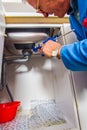 Repairman working with caulking gun Royalty Free Stock Photo