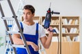 The repairman working with drilling drill perforator Royalty Free Stock Photo