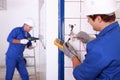 Repairmen in action Royalty Free Stock Photo