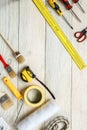 Repairment tools objects isolated on wooden surface