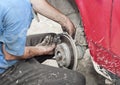 Repairs a brake Royalty Free Stock Photo