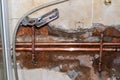 Water pipe burst damage in a bathroom