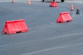 Repaving. New asphalt road. Plastic road fencing. Red barriers on the road Royalty Free Stock Photo