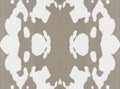 Repeatable background pattern that looks like an ink blot inspired by bark of birch tree in beige and white